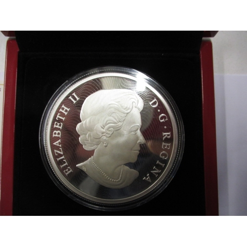 66 - A 2015 Canadian $50 fine silver coin and 3 proof silver stamp coins, all in plastic protection capsu... 