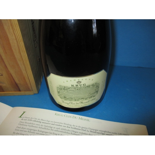 144 - A 75cl bottle 1990 Krug Clos du mesnil champagne brut blanc de blance, with original wood packing bo... 