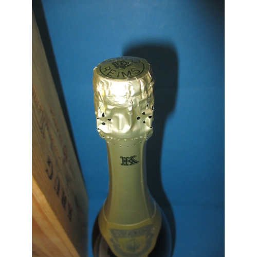 144 - A 75cl bottle 1990 Krug Clos du mesnil champagne brut blanc de blance, with original wood packing bo... 