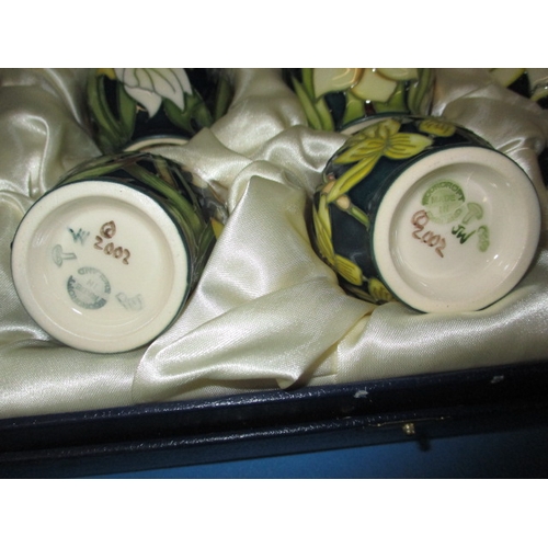 116 - A boxed set of 6 Moorcroft egg cups in the daffodil design, dated 2002, all in unused condition