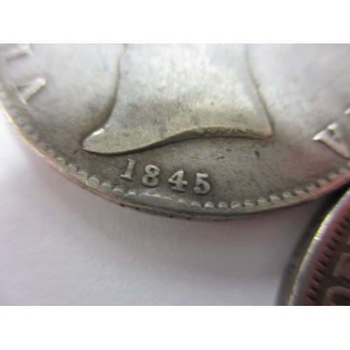 65 - Four Victorian silver coins, to include 1846 half crown, all in circulated condition, various dates ... 