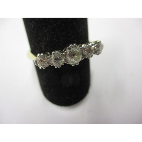 An Edwardian 18ct gold and platinum 5 stone diamond ring, approx. ring size ‘Q’, approx. weight 2.9g, approx. total diamond weight 85pts, in good useable pre-owned condition