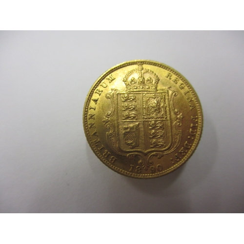 32 - A Victorian gold half sovereign dated 1890, having shield back, a circulated coin with very fine def... 