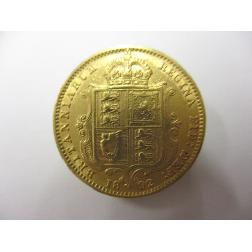 34 - A Victorian gold half sovereign date 1892, having shield back, a circulated coin with very fine defi... 