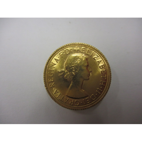 42 - An Elizabeth II gold sovereign dated 1963, a circulated coin with very fine definition of features