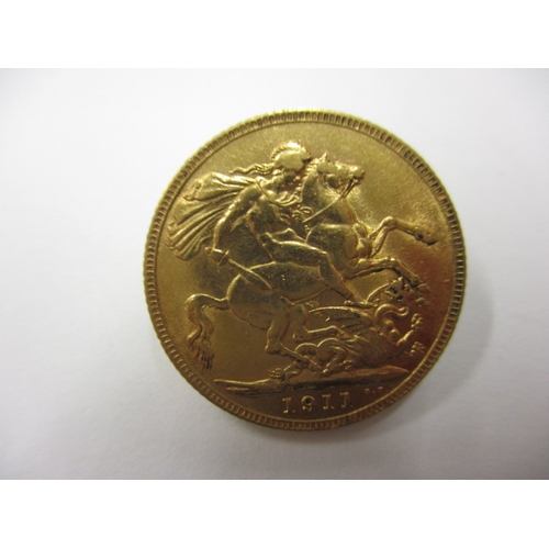 44 - A George V gold sovereign, dated 1911, a circulated coin with good definition of features