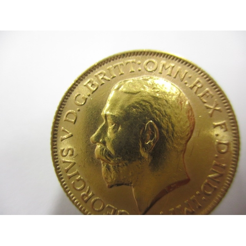 45 - A George V gold sovereign, dated 1925, a circulated coin with very fine definition of features