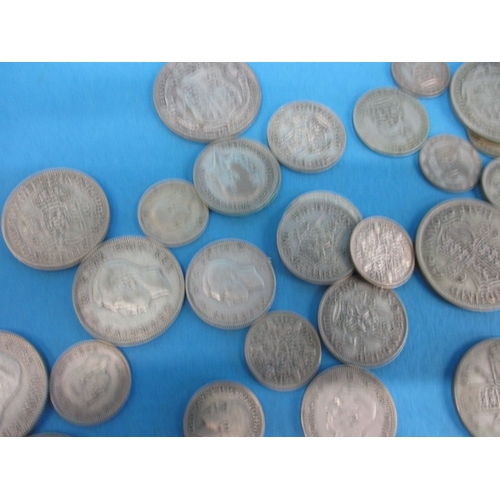 58 - A parcel of pre-47 part silver coins, all in circulated condition, various grades, approx. parcel we... 