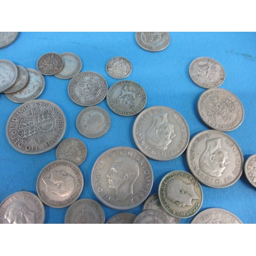 58 - A parcel of pre-47 part silver coins, all in circulated condition, various grades, approx. parcel we... 