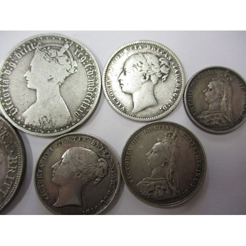 60 - A parcel of Victorian silver coins, all circulated with two double florins in near EF grade, approx.... 