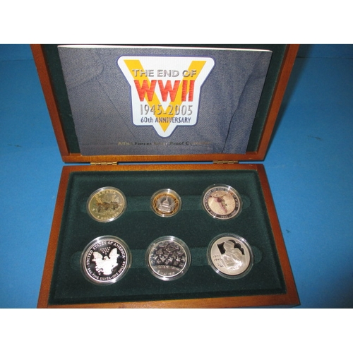 61 - A boxed set of silver proof commemorative coins, “The Allied Forces”, with original paperwork