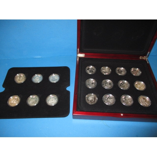 62 - A cased set of 18 proof £5 commemorative coins, “The History of the Royal Navy, all in plastic capsu... 