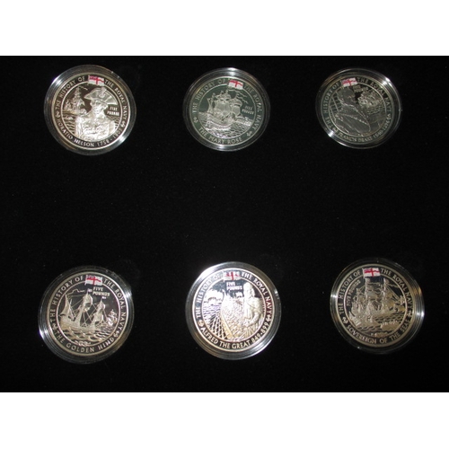 62 - A cased set of 18 proof £5 commemorative coins, “The History of the Royal Navy, all in plastic capsu... 