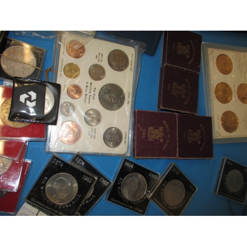 63 - A large quantity of collectable coins, to include Royal mint sets and some silver