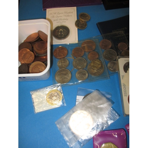 63 - A large quantity of collectable coins, to include Royal mint sets and some silver