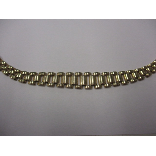 18 - A 9ct yellow gold choker necklace, approx. linear length 42cm, approx. weight 19.9g in useable pre-o... 