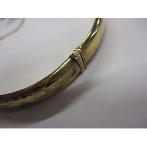 19 - A vintage 9ct yellow gold bangle, approx. diameter 6cm, approx. weight 10.9g in useable pre-owned co... 