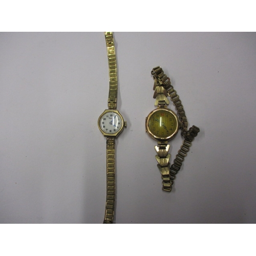 A vintage Rotary 9ct gold watch with integral gold strap, and another ...