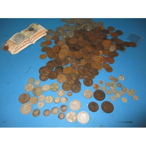 215 - A large quantity of pre-decimal coins, to include silver and part silver examples and a Henry VIII q... 