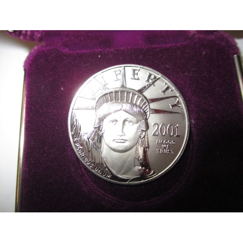 182 - A 2001 American Eagle .9995 platinum coin, approx. weight 31.1g in uncirculated condition with origi... 