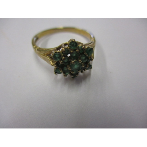 4 - A 9ct yellow gold and emerald? Daisy ring, approx. ring size ‘M+’, approx. weight 2.2g, in good usea... 