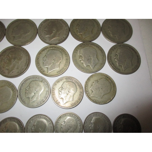 217 - A parcel of pre-decimal silver and part silver coins, approx. parcel weight 498.5g, all in circulate... 