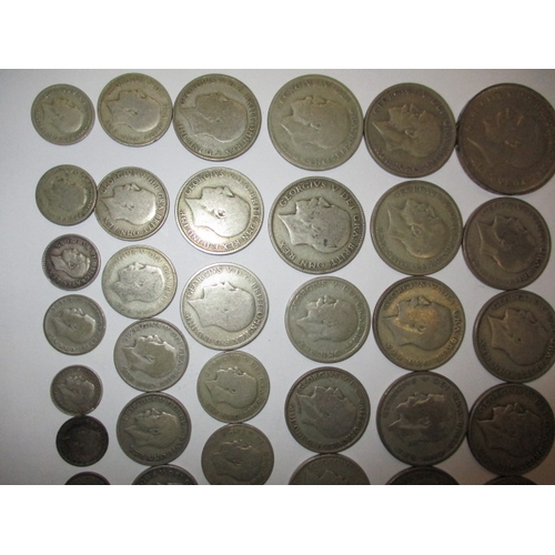 217 - A parcel of pre-decimal silver and part silver coins, approx. parcel weight 498.5g, all in circulate... 