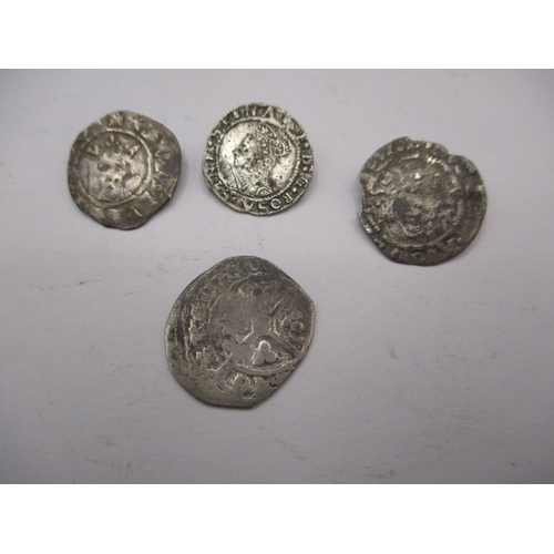 200 - Four Silver hammered coins, to include an Elizabeth I threehalfpence?, all in well circulated condit... 