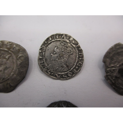 200 - Four Silver hammered coins, to include an Elizabeth I threehalfpence?, all in well circulated condit... 