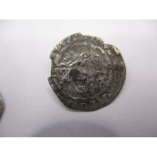 200 - Four Silver hammered coins, to include an Elizabeth I threehalfpence?, all in well circulated condit... 