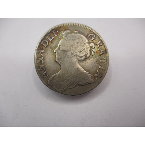 196 - A silver Queen Anne shilling, dated 1708, a circulated coin with reasonable definition of features