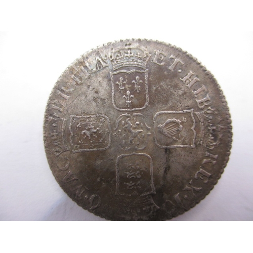 197 - A William III silver shilling dated 1696 with Norwich mint mark, a circulated coin with fine definit... 