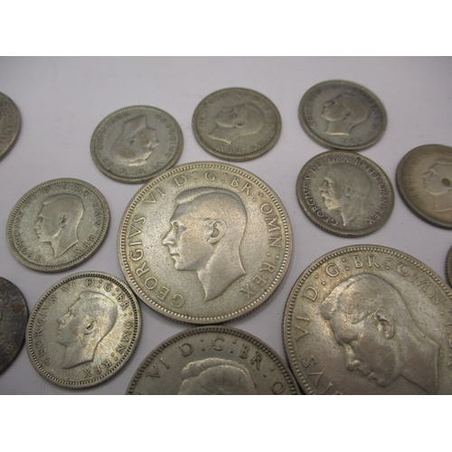 209 - A parcel of silver and part silver coins, all in circulated condition, some very worn, approx. gross... 