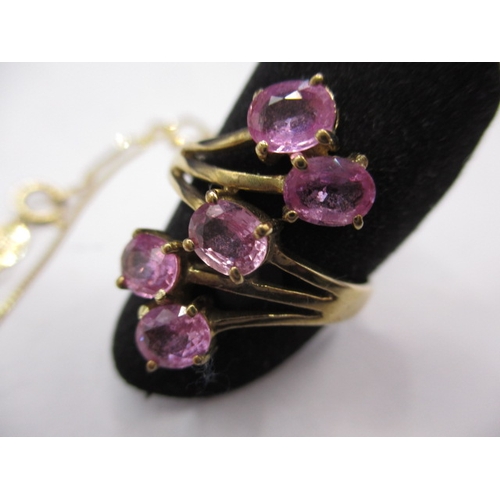 34 - A parure of 9ct yellow gold and pink sapphire, approx. ring size ‘Q’, approx. gross parcel weight 5.... 