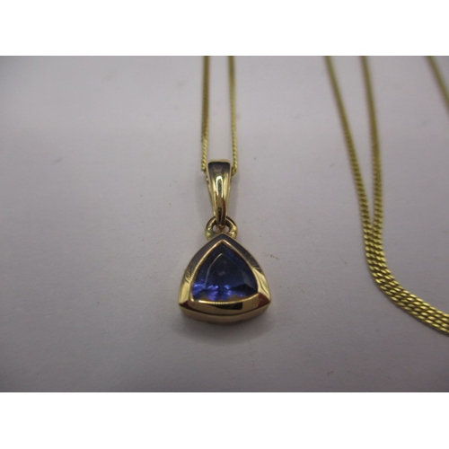 71 - A 9ct yellow gold necklace chain with 18ct gold and tanzanite pendant, approx. gross weight 2.1g app... 