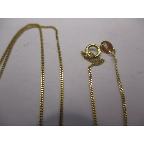 71 - A 9ct yellow gold necklace chain with 18ct gold and tanzanite pendant, approx. gross weight 2.1g app... 