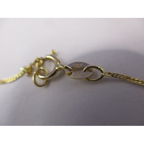 71 - A 9ct yellow gold necklace chain with 18ct gold and tanzanite pendant, approx. gross weight 2.1g app... 