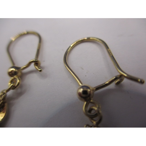 72 - A pair of 9ct yellow gold earrings, approx. weight 2.3g in near unused condition