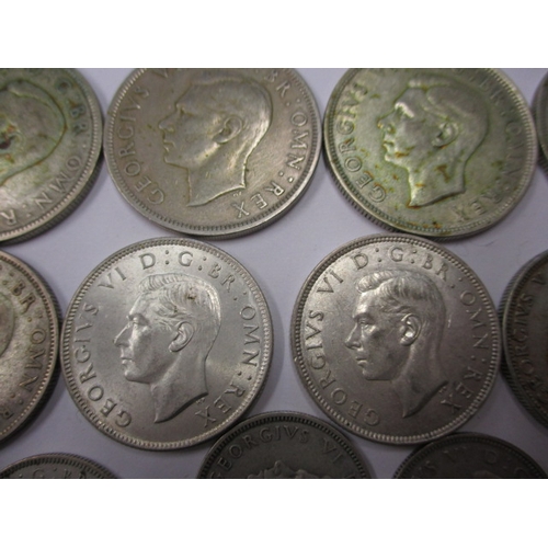 210 - A parcel of pre-decimal part silver coins, all in circulated condition with some very fine grades, a... 