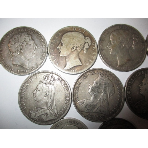 211 - A parcel of Georgian and later silver coins, to include crowns, all in circulated condition with som... 