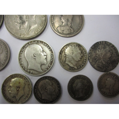 211 - A parcel of Georgian and later silver coins, to include crowns, all in circulated condition with som... 