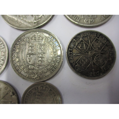 211 - A parcel of Georgian and later silver coins, to include crowns, all in circulated condition with som... 