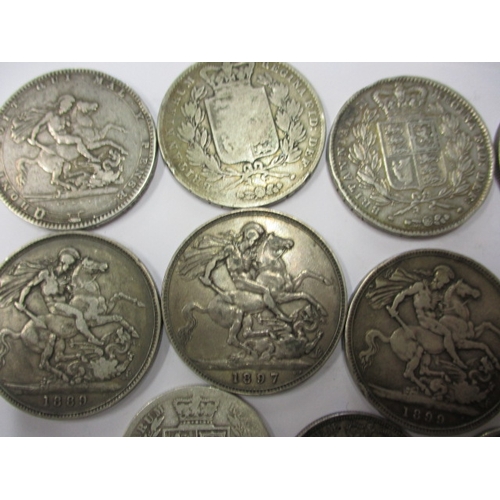 211 - A parcel of Georgian and later silver coins, to include crowns, all in circulated condition with som... 