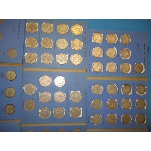 220 - A parcel of pre-decimal coin in collectors folders, to include silver and part silver examples, all ... 