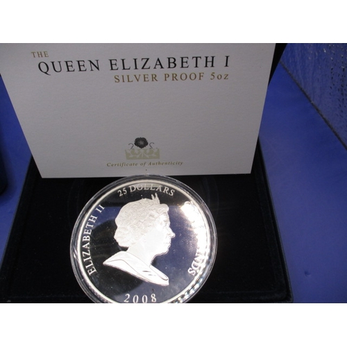 191 - A 2008 silver proof five ounce collectors coin, a Royal mint silver crown and a silver £5 coin cover