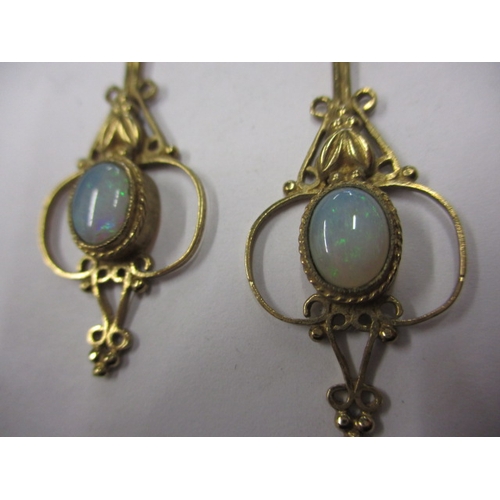 81 - A pair of 9ct gold and opal pendant earrings, in the art nouveau style, in useable pre-owned conditi... 