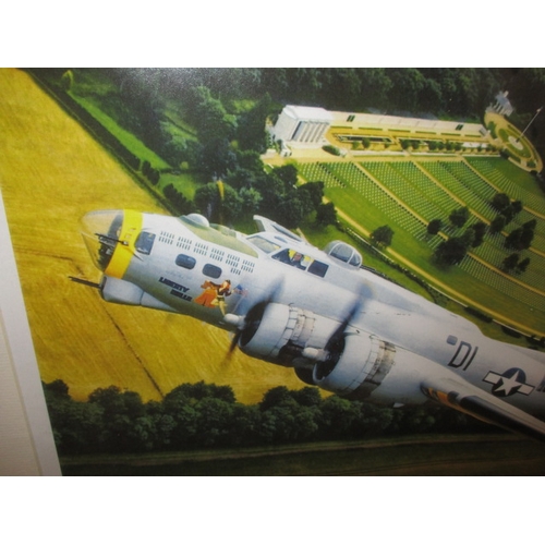 355 - A framed photograph of a WWII Boeing B17G Flying Fortress over Cambridge  American war Cemetery, dat... 