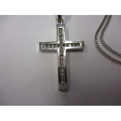 86 - A 9ct white gold necklace with diamond set cross pendant, in good useable pre-owned condition with w... 