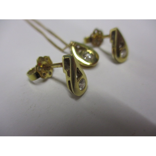 87 - A 9ct yellow gold and diamond necklace, and matching earrings, in useable pre-owned condition, appro... 