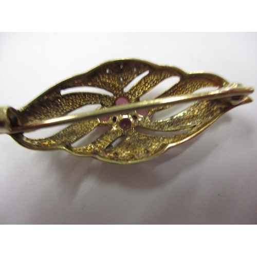 95 - A 9ct gold, diamond and ruby brooch, in useable pre-owned condition, approx. weight 3.5g